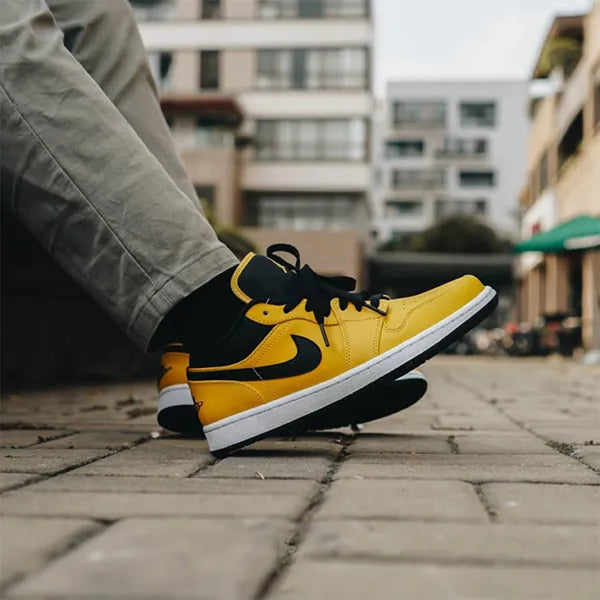 Jordan 1 Low University Gold (553558-700) | SneakerClassics