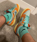 Nike SB Dunk Low Orange Emerald Rise (DV5429-800) | SneakerClassics